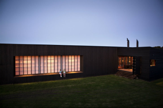 Illustration for article titled This Modern Wooden Beach House Was Built for Its Beautiful Views